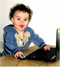 toddler on the computer